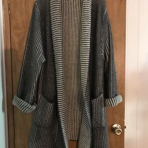 Women long sweater size small, seems to run a bit bigger than a small